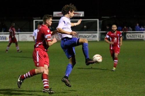 Enfields Harry Ottaway controls the ball under pressure from Sonny Miles