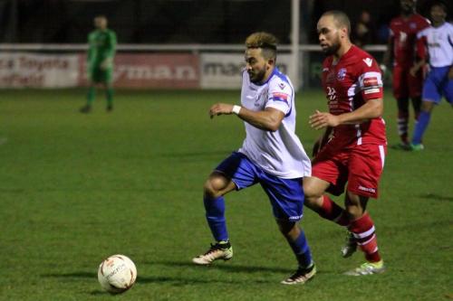 Enfields Tyler Campbell breaks clear of Damien Scannell