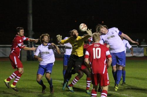 Mark Kirby (R) heads Enfields late equaliser