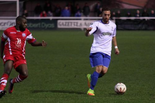 Tonbridges Alex Akrofi (L) and Enfields Scott Shulton