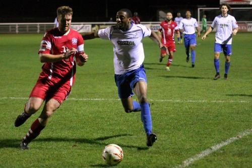 Tonbridges Sonny Miles (L) challenges Ricky Gabriel
