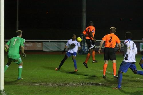 Billericays Abs Symour (orange, L) misses a header but Jonathan Muleba cant capitalise