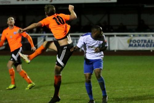 Billericays Adam Cunnington (10) heads clear from Harold Joseph