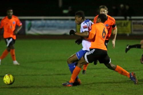 Billericays Alex Stephenson (6) challenges Karl Oliyide