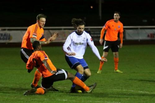 Billericays Ibrahim Diallo challenges Harry Ottaway (white)