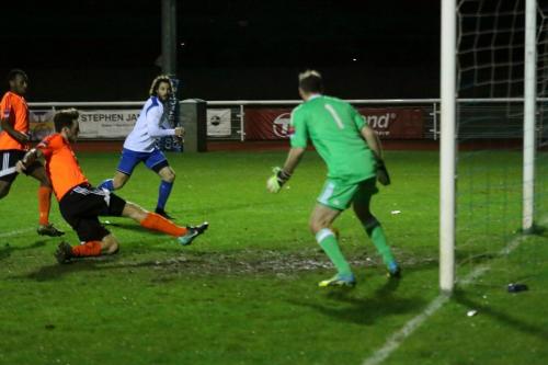 Billericays Rob Swaine hits the post with an attempted clearance