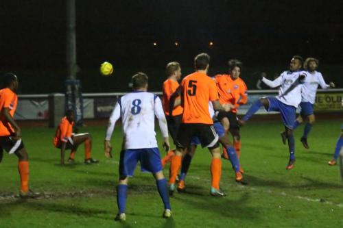 Enfields Bobby Devyne  (2nd R) shoots
