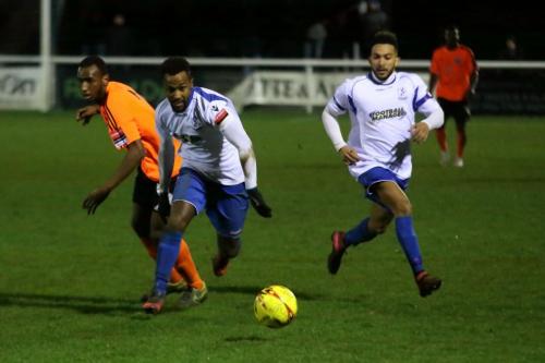 Enfields Bobby Devyne breaks clear of Ibrahim Diallo (L) with Tyler Campbell offering support