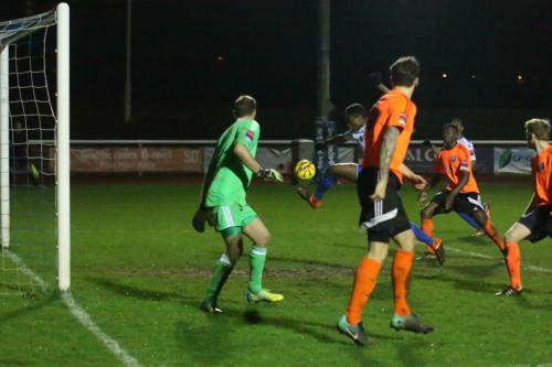 With an open goal in front of hiom, Enfields Karl Oliyide just fails to make contact