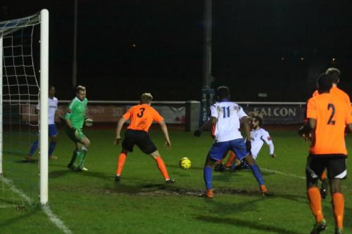 Yet another Enfield chance goes begging as Harry Ottaway (white, R) is blocked by a defender