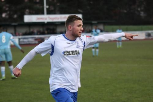 Billy Crook celebrates after scoring the second goal
