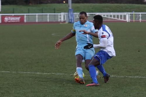 Bobby Devyne, having already gone past the keeper, rounds Nathan Campbell to score the first goal