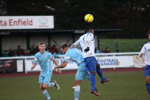 Enfields Bobby Devyne (R) challenges Luke Wilson