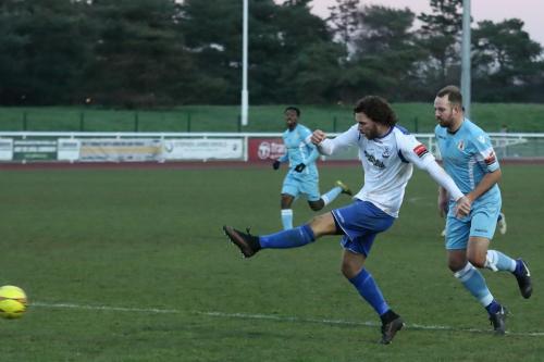 Enfields Harry Ottaway shoots across the face of goal