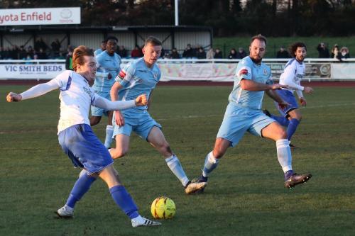 Enfields Mickey Parcell crosses for Harry Ottaway (far R) whose shot was saved