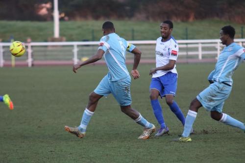 Enfields Ricky Gabriel and Grays Nathan Campbell (L) and Lartey Sarpong