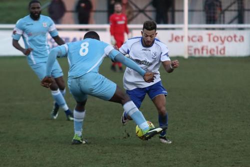 Grays Kwabena Osei (L) challenges Tyler Campbell