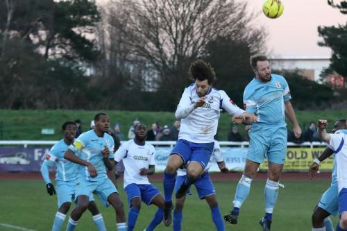 Grays Luke Wilson (R) heads clear from Harry Ottaway