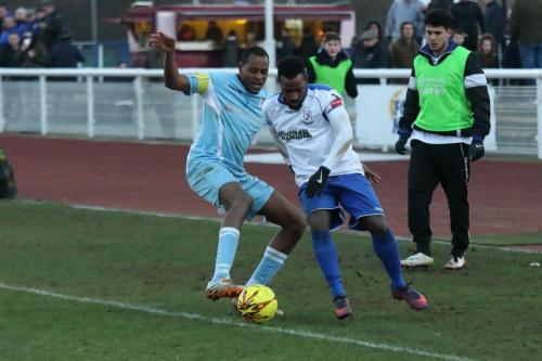Grays Nathan Campbell (L) and Enfields Bobby Devyne