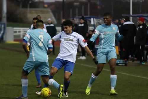 Grays Ryan Mahal (L) and Etienne Kabobola and Enfields Samir Bihmoutine