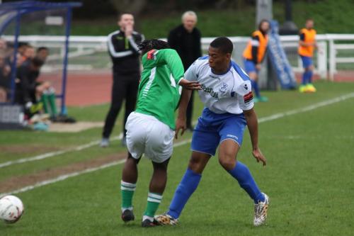 A good spot buy the officials as Enfields Jonathan Muleba (R) is penalised for treading on Kadell Daniels foot