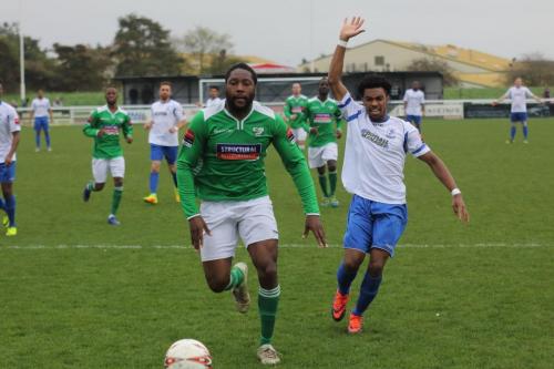 Enfields Dernell Wynter appeals for a corner as Jerry Nnamani knocks the ball out of play