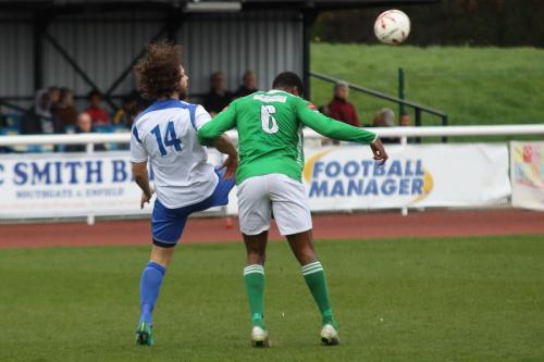 Enfields Harry Ottaway (L) and Leatherheads Jerry Nnamani