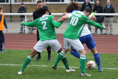 Enfields Harry Ottaway challenged by Yannis Ambroisine (2) and Luke Moore