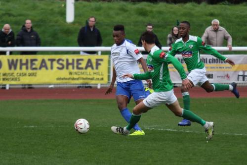 Enfields Karl Oliyide beats Joe Howe to set up the winning goal