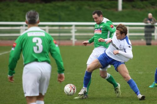 Enfields Mickey Parcell (R) tackles Luke Moore
