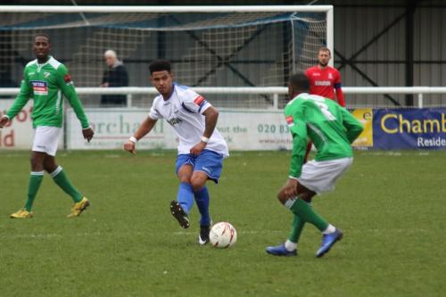 Enfields Nathan Livings and Leatherheads Daniel Carr (L) and DSean Theobalds