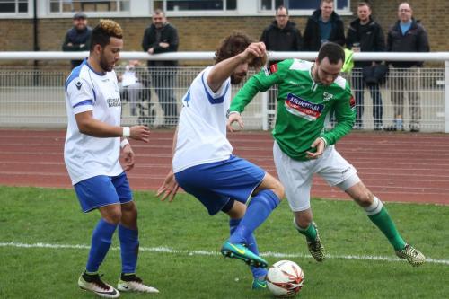 Enfields Tyler Campbell (L) and Harry Ottaway and Leatherheads Luke Moore