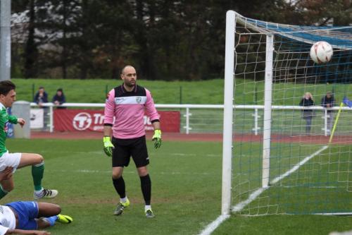Leatherhead keeper Louis Wells can only watch as Karl Oliyides shot goes wide