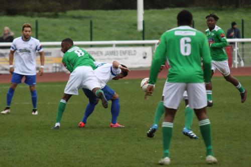 Leatherheads DSean Theobalds (8) conceds a free kick for climbing over Nathan Livings