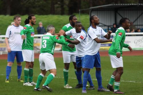 Leatherheads Danny Murphy (3) gets to grips with Harold Joseph at a set piece
