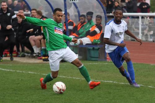 Leatherheads Jerome Fedrico (L) and Enfields Ricky Gabriel