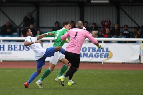 Leatherheads Joe Howe (centre) and Louis Wells (R) combine to close out Dernell Wynter