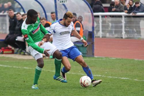 Leatherheads Paul Semakula (L) and Enfields Tyler Campbell