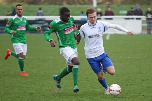 Leatherheads Paul Semakula (green) challenges Mickey Parcell