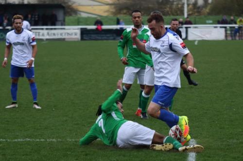 Leatherheads Yannis Abroisine tackles Scott Shulton