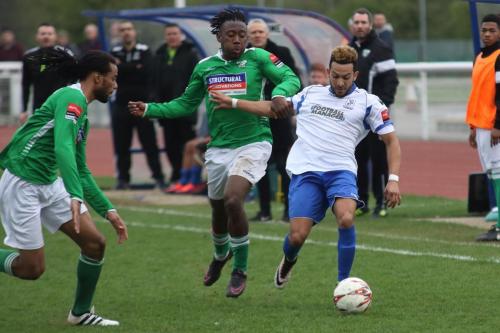 Leatherheads Yannis Ambroisine (L) and Kadell Daniel and Enfields Tyler Campbell