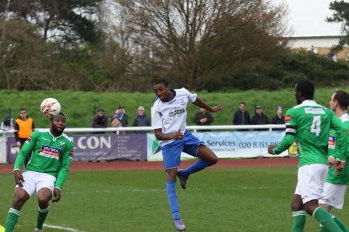 Ricky Gabriel (centre) scores Enfields equalising goal
