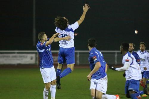 Lowestofts Ross Jarvis (L) and Enfields Harry Ottaway challenge for a high ball