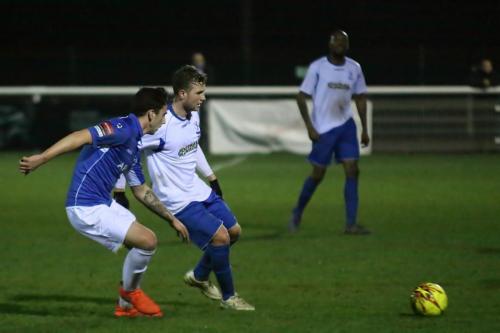 Lowestofts Travis Cole (L) and Enfields Billy Crook