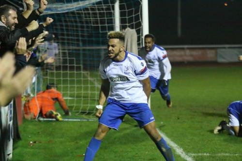 Tyler Campbell celebrates his late equalising goal for Enfield