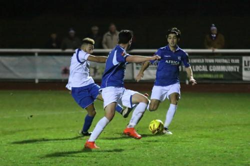 Tyler Campbell scores the first of his two goals for Enfield, immediately after Lowestofts opener