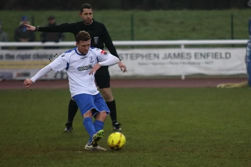 Billy Crook gives Enfield the lead from the penalty spot