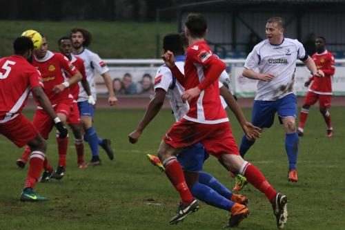 Enfield captain Mark Kirby (R) joins the attack in the closing stages