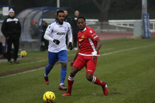 Enfields Bobby Devyne (L) and Mersthams Kristian Campbell