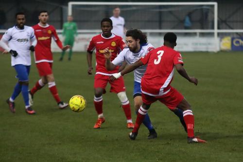 Enfields Harry Ottaway tries to get past Kristian Campbell (3)